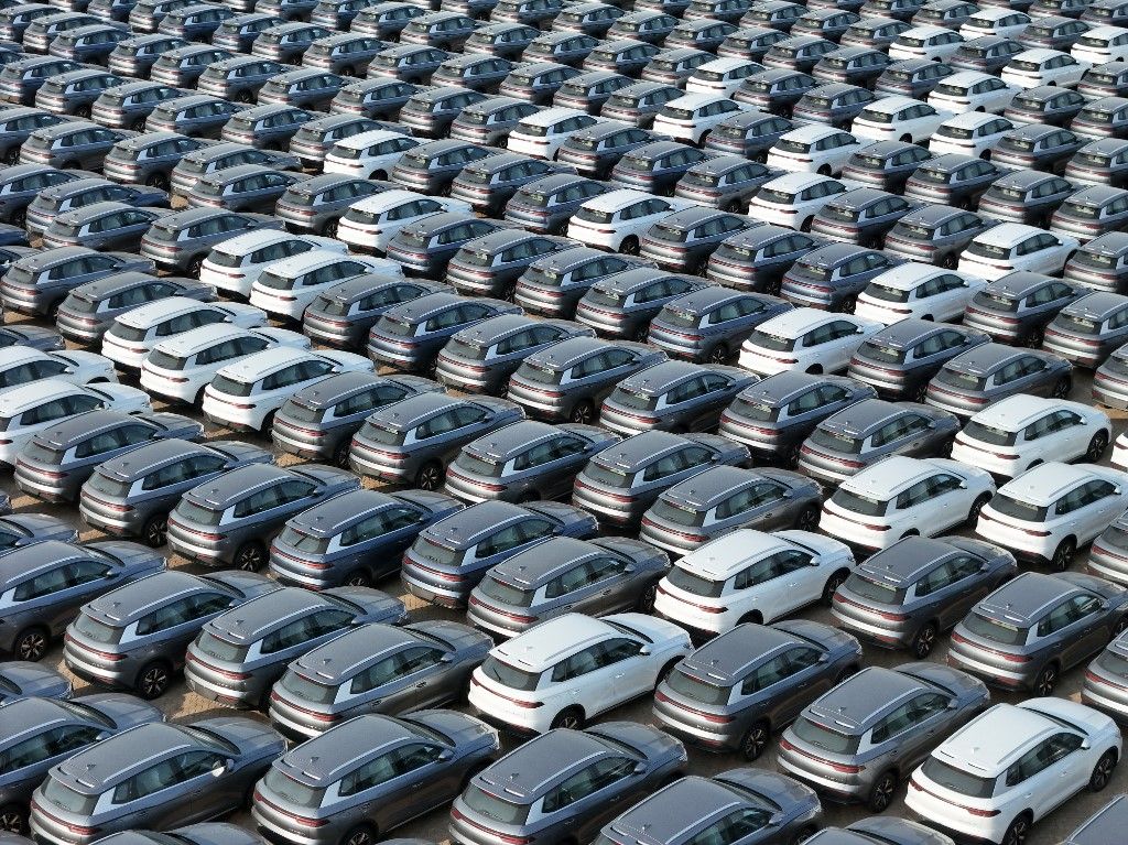 A large number of BYD electric cars are waiting to be shipped for export at the Penglai Port area of Yantai Port in Yantai, China, on April 18, 2024. (Photo by Costfoto/NurPhoto) (Photo by CFOTO / NurPhoto / NurPhoto via AFP)