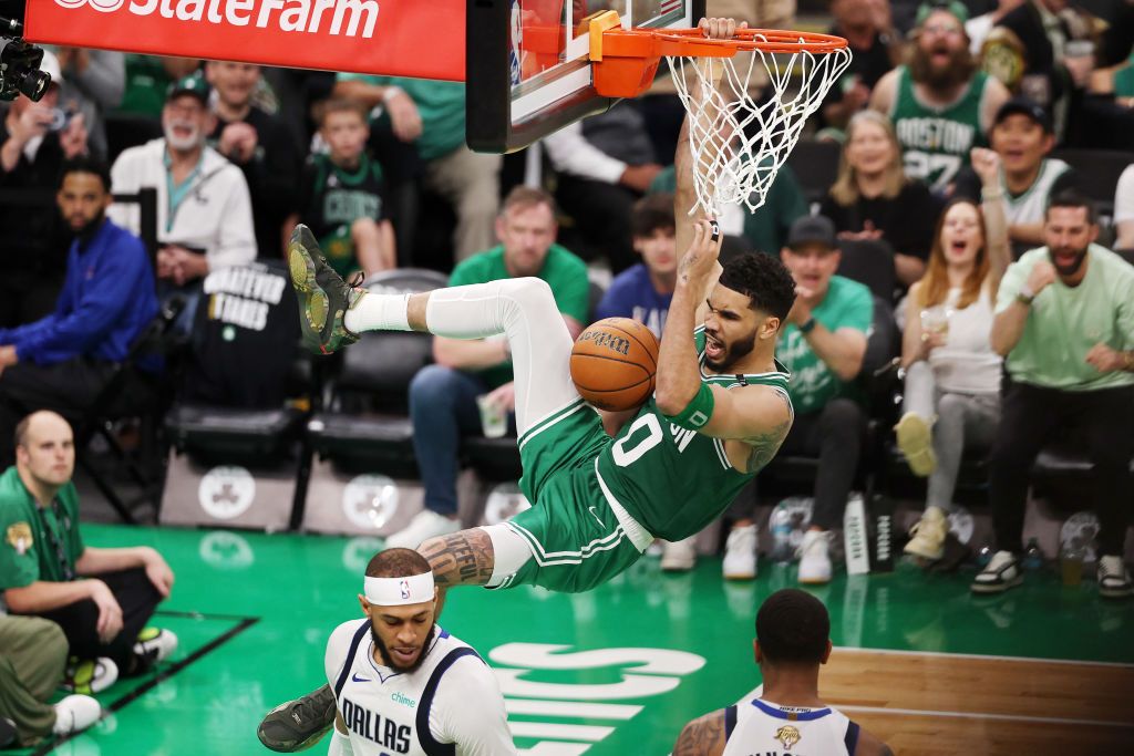 BOSTON, MASSACHUSETTS - JUNE 17: Jayson Tatum #0 of the Boston Celtics reacts after a dunk during the third quarter of Game Five of the 2024 NBA Finals against the Dallas Mavericks at TD Garden on June 17, 2024 in Boston, Massachusetts. NOTE TO USER: User expressly acknowledges and agrees that, by downloading and or using this photograph, User is consenting to the terms and conditions of the Getty Images License Agreement. (Photo by Elsa/Getty Images)