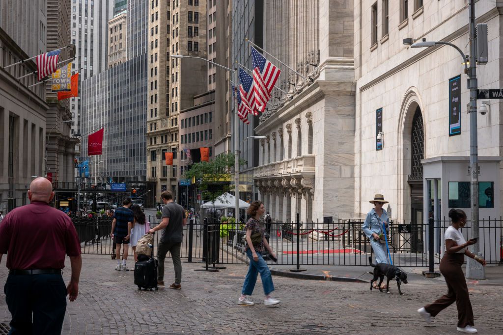 MBH NEW YORK, NEW YORK - JULY 22: People walk by the outside of the New York Stock Exchange (NYSE) on July 22, 2024 in New York City. Markets were up in morning trading as the world reacted to the news that U.S. President Joe Biden has ended his re-election campaign and endorsed Vice President Kamala Harris. (Photo by Spencer Platt/Getty Images)