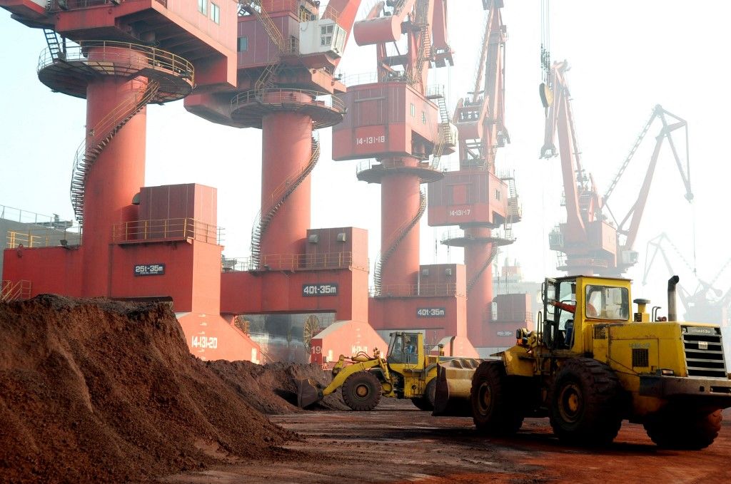 --FILE--Wheel loaders transport rare earth at the Port of Lianyungang in Lianyungang city, east Chinas Jiangsu province, 31 October 2010.

Chinas exports of rare earth metals burst through the $100,000-per-tonne mark for the first time in February, up almost ninefold from a year before, while the volume of trade stayed far below historical averages. (Photo by Wang chun lyg / Imaginechina / Imaginechina via AFP)