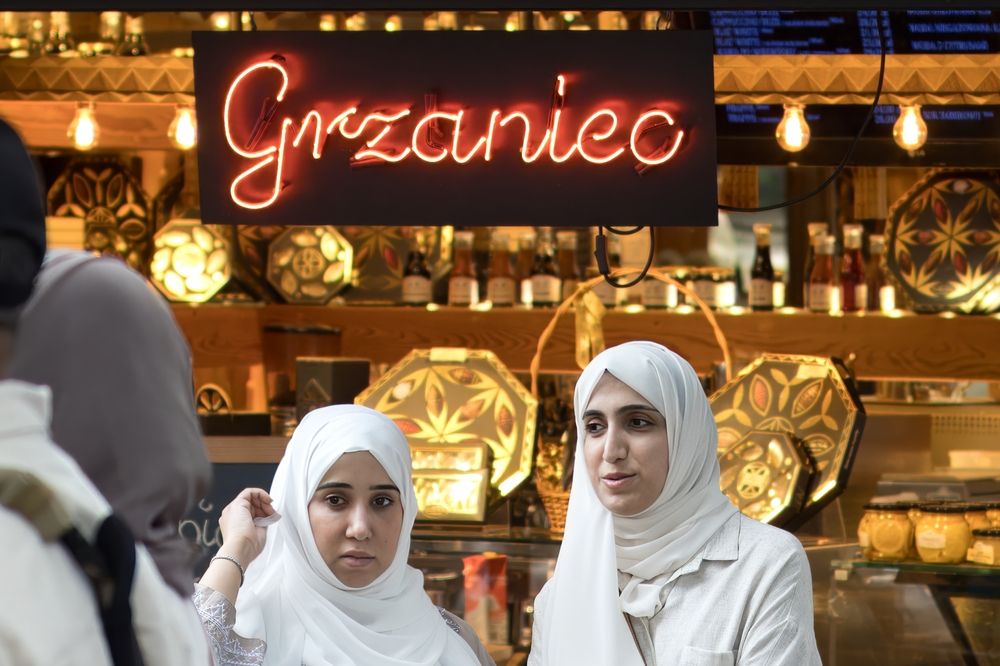 Tourists,From,The,Middle,East,In,Zakopane,,Posing,Against,The