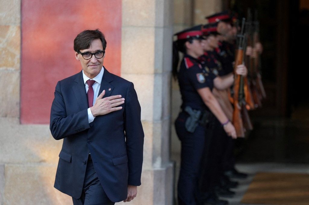 Catalonia's Socialist Party (PSC) party's leader Salvador Illa gestures as he leaves after being elected Catalan regional president during a plenary session at the Parliament of Catalonia, in Barcelona on August 8, 2024. Salvador Illa was elected as Catalonia's new leader, becoming the first regional head not from a pro-independence party since 2010. The party of wanted separatist figurehead Carles Puigdemont had unsuccessfully requested the investiture vote be postponed after he returned to Spain for a brief rally in Barcelona and slipped away without being arrested. (Photo by Cesar Manso / AFP)