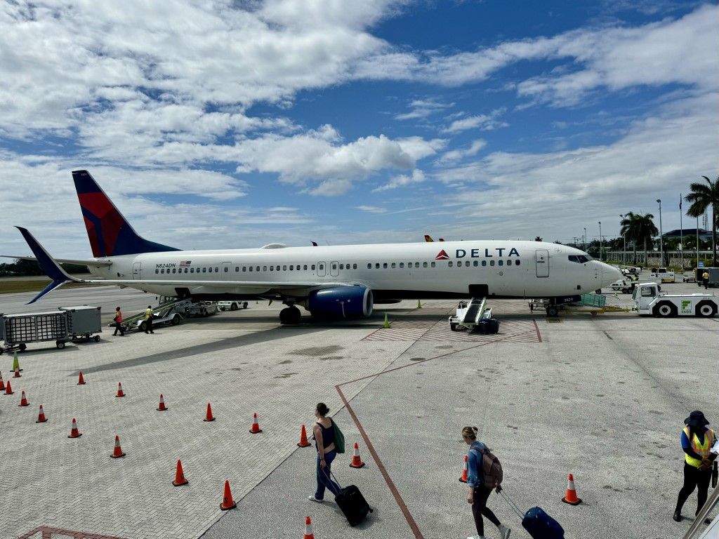 A Delta Air lines Boeing 737-932(ER) is seen at Owen Roberts International Airport (GCM) in George Town, Cayman Islands on February 14, 2024. (Photo by Daniel SLIM / AFP)
Crowdstrike