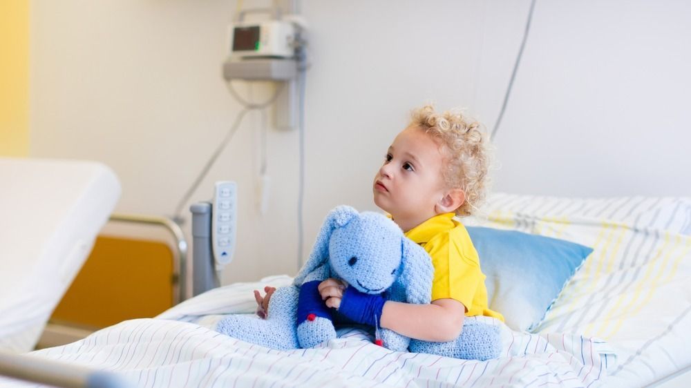 Little,Boy,Playing,With,His,Toy,In,Bed,In,Hospital