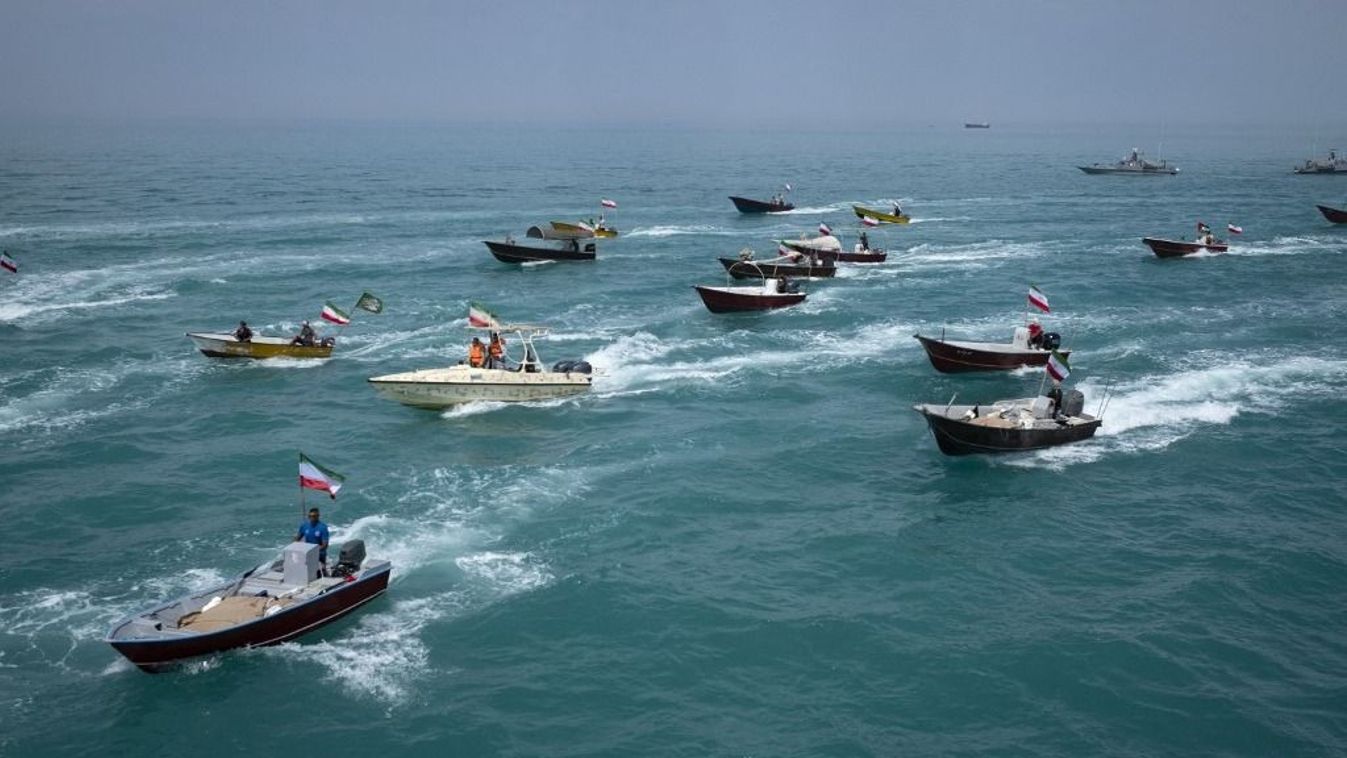 Basij paramilitary force speed boats are sailing along the Persian Gulf during the Islamic Revolutionary Guard Corps (IRGC) marine parade to commemorate Persian Gulf National Day, near the Bushehr nuclear power plant in the seaport city of Bushehr, Bushehr province, in the south of Iran, on April 29, 2024. Persian Gulf National Day, which celebrates the expulsion of the Portuguese from the Strait of Hormuz and the Persian Gulf in 1622 by the Safavid forces led by Imam Quli Khan under the command of Shah Abbas I, is observed on the 10th of Ordibehesht in the Iranian calendar, typically falling in late April or early May. (Photo by Morteza Nikoubazl/NurPhoto) (Photo by Morteza Nikoubazl / NurPhoto / NurPhoto via AFP)