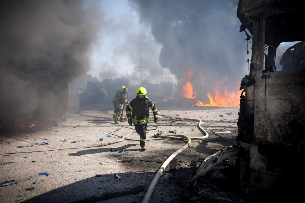 This handout photograph taken and released by the Ukrainian Emergency Service on August 26, 2024 shows rescuers working to extinguish a fire following a missile attack at an undisclosed location in Odesa region of Ukraine. Russian drones and missiles on August 26, 2024 targeted 15 regions across Ukraine in an overnight barrage aimed mainly at energy infrastructure, Ukrainian Prime Minister Denys Shmygal said. (Photo by Handout / UKRAINIAN EMERGENCY SERVICE / AFP) / RESTRICTED TO EDITORIAL USE - MANDATORY CREDIT "AFP PHOTO / HO / UKRAINIAN EMERGENCY SERVICE" - NO MARKETING NO ADVERTISING CAMPAIGNS - DISTRIBUTED AS A SERVICE TO CLIENTS