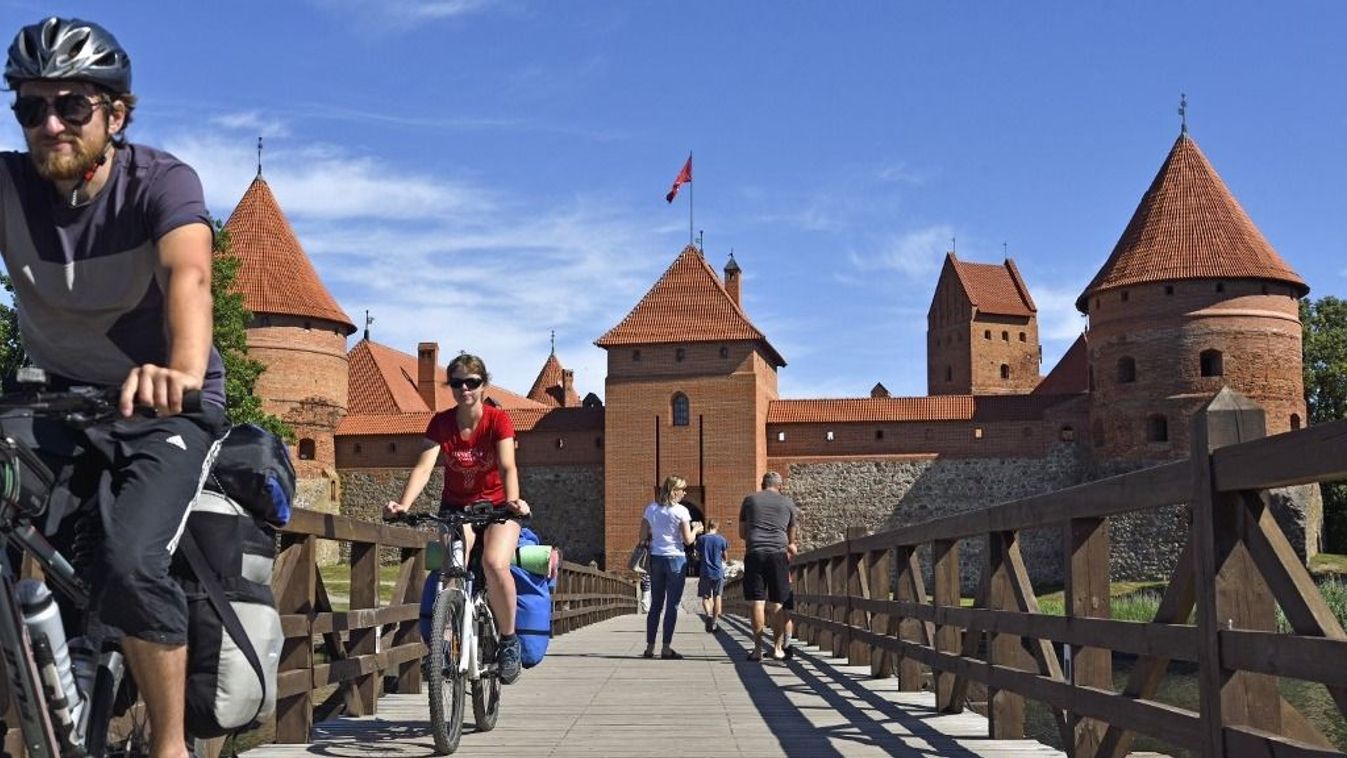 Wooden bridge leading to the Trakai Castle on an island in Lake Galve, Lithuania, Europe (Photo by GOUPI CHRISTIAN / Robert Harding RF / robertharding via AFP)