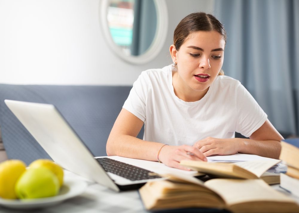 Portrait,Of,Young,Woman,Studying,At,Home,During,Online,Courses