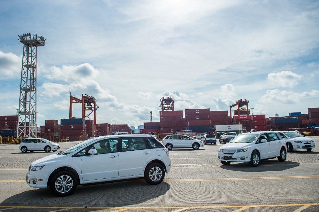 BYD pure electric e6 cars to be exported to Thailand drive into a cargo ship at the Dachanwan Port in Shenzhen city, south China's Guangdong province, 12 July 2018.

China's battery and electric car maker BYD Co Ltd delivered 100 pure electric e6 cars to Thailand on Thursday (12 July 2018). These electric cars will be VIP taxis in Bangkok. (Photo by Blanches / Imaginechina / Imaginechina via AFP)