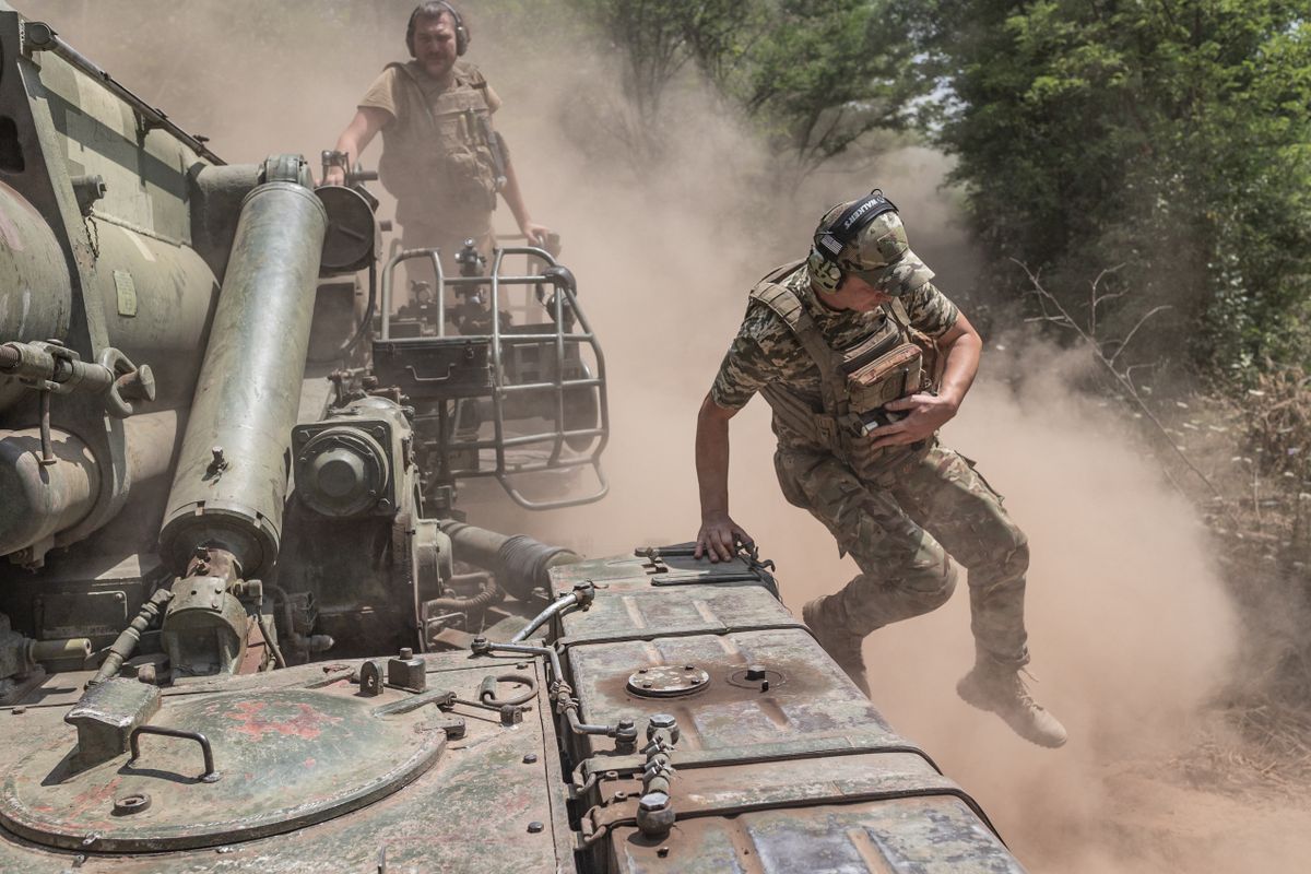 Ukrainian soldiers prepare for combat in Donetsk