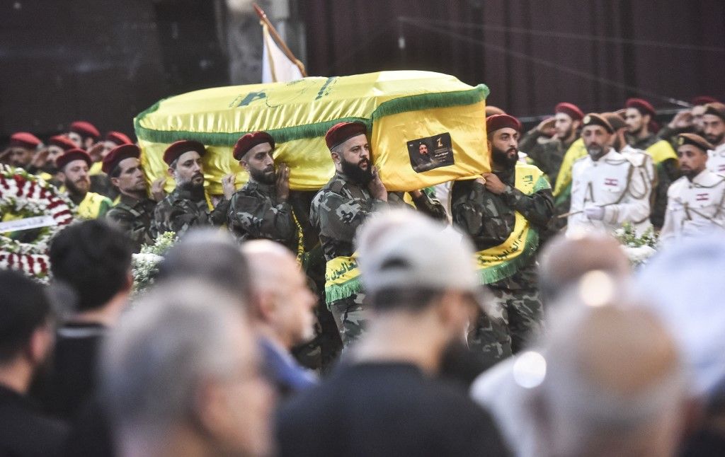 Hezbollah Fighters and Mourners Attend Funeral of Top Commander Fuad Shukr in Beirut
Hezbollah