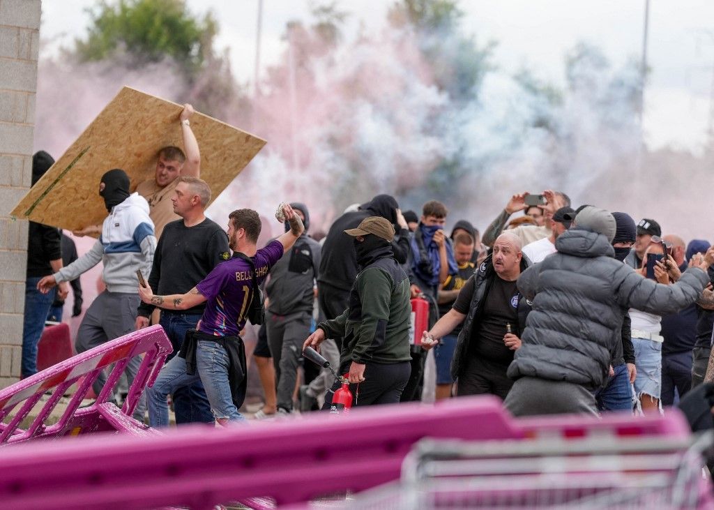 Clashes between police and far-right protesters in the UK