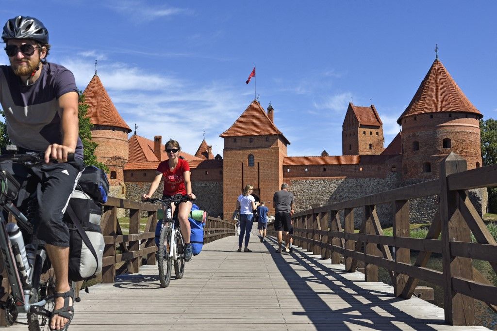 Wooden bridge leading to the Trakai Castle on an island in Lake Galve, Lithuania, Europe (Photo by GOUPI CHRISTIAN / Robert Harding RF / robertharding via AFP)