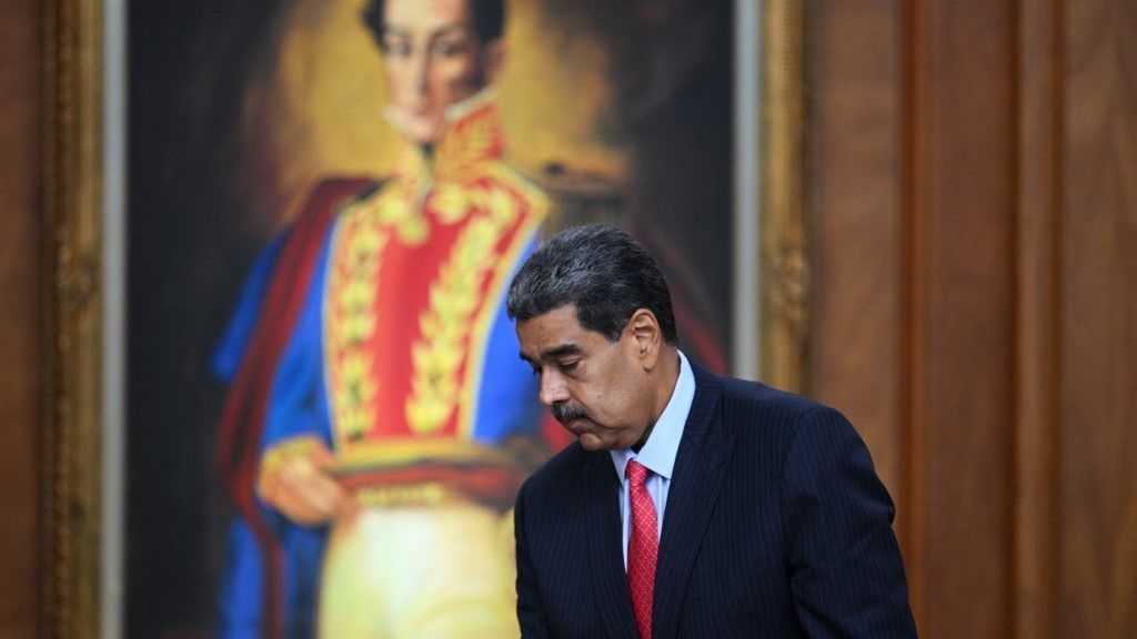 Venezuelan President Nicolas Maduro leaves a press conference to the international media about the presidential election at the Miraflores presidential palace in Caracas on July 31, 2024. . International pressure mounted Wednesday on Venezuela's President Nicolas Maduro to release voting records to back his contested election victory claim that has sent thousands onto the streets in protest, leaving 16 dead. (Photo by Federico PARRA / AFP)