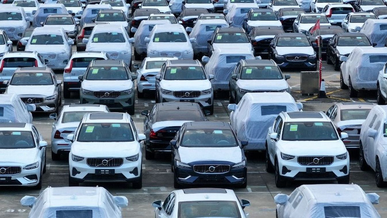 Volvo cars are lining up for export at the Port of Nanjing in Nanjing, China, on August 6, 2024. According to the China Association of Automobile Manufacturers, data collated by the General Administration of Customs show that in the first half of this year, China's auto exports are reaching 2.932 million units, an increase of 25.3%; exports are amounting to 55.16 billion US dollars, up 18.8% year on year. (Photo by Costfoto/NurPhoto) (Photo by CFOTO / NurPhoto / NurPhoto via AFP)