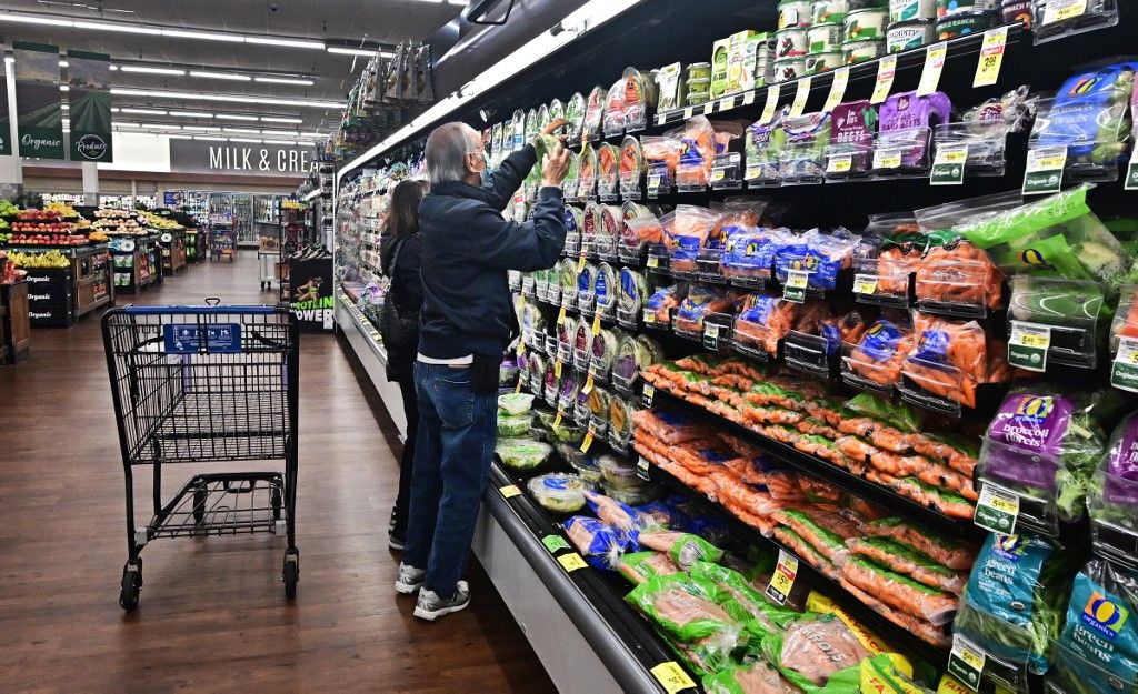 People shop at a supermarket in Montebello, California, on May 15, 2024. The Consumer Price Index climbed 3.4% in April from the previous year, according to figures released by the Bureau of Labor Statistics, offering some relief for consumers who have had to deal with surging food prices since the March 2020 Covid-19 lockdown. (Photo by Frederic J. BROWN / AFP)