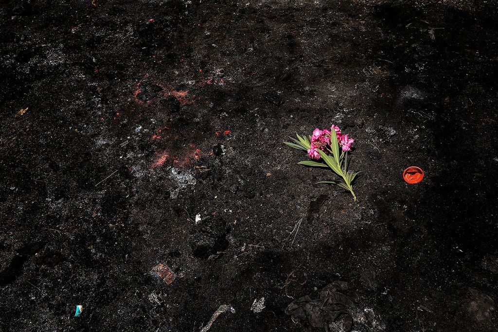 Raising The StakesAugust 10, 2024, Sidon, Lebanon: A flower lays on the black charred ground where the car of Hamas commander Samer al-Hajj burned after it was struck in an Israeli drone in the southern Lebanese port city of Sidon. An Israeli drone hit the car of al-Hajj, head of Hamas security inside the Palestinian refugee camp of Ain al-Hilweh, 40 kilometers south of Beirut. killing him instantly. (Credit Image: © Marwan Naamani/ZUMA Press Wire)
