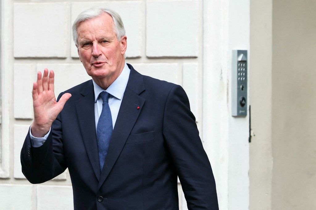 Newly appointed Prime minister Michel Barnier gestures before the handover ceremony at the Hotel Matignon in Paris, on September 5, 2024. France's President Emmanuel Macron appointed former right-wing minister and European Commissioner Michel Barnier as Prime Minister on September 5, 60 days after the second round of legislative elections that resulted in a National Assembly without a majority. (Photo by Thomas SAMSON / AFP)