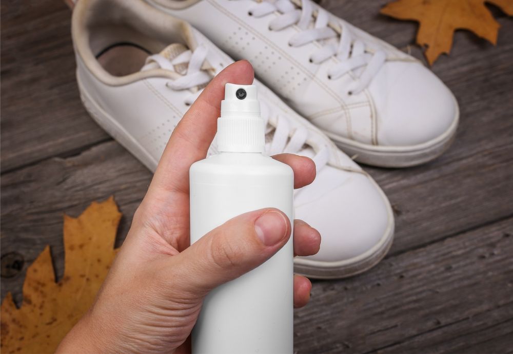 Cleaning,Shoes.,Close,Up,Of,Water,Repellent,Shoe,Spray.,Rain