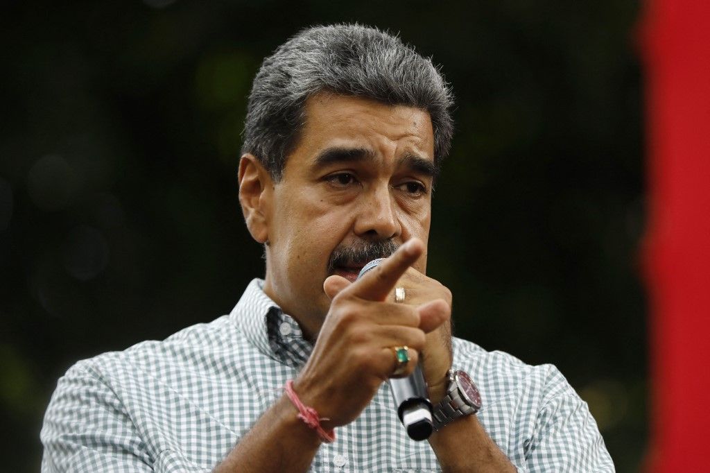 Venezuelan President Nicolas Maduro gestures as he delivers a speech during a rally in Caracas on August 28, 2024. The Venezuelan ruling party called for a mobilization on August 28, to 'celebrate' Maduro's victory, which has been rejected by the United States, the European Union and several countries in the region. (Photo by Pedro Rances Mattey / AFP)