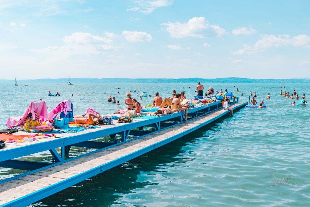 Balaton,,Hungary,-,July,14,,2018:,People,Swimming,In,Blue