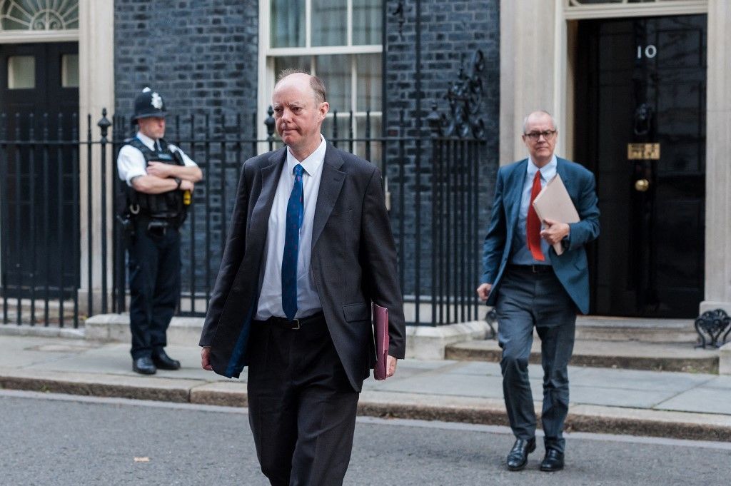 Prof Chris Whitty, the government’s chief medical adviser (L) and Sir Patrick Vallance, the government’s chief scientific adviser (R) leave 10 Downing Street in central London to attend Cabinet meeting temporarily held at the Foreign Office to comply with social distancing guidelines due to the ongoing coronavirus pandemic, on 30 September, 2020 in London, England. (Photo by WIktor Szymanowicz/NurPhoto) (Photo by WIktor Szymanowicz / NurPhoto / NurPhoto via AFP)
covid