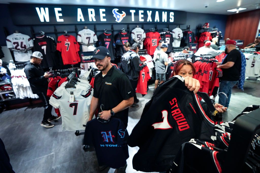 HOUSTON, TEXAS - APRIL 23: Houston Texans fans flock to the Texans team store to pick up newly-released merchandise son Tuesday, April 23, 2024 in Houston. The Texans officially release four new uniforms during a party Tuesday. (Brett Coomer/Houston Chronicle via Getty Images)