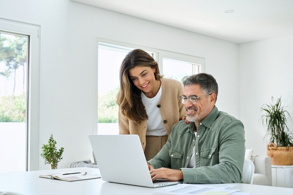 Smiling,Middle,Aged,Senior,Man,Working,On,Computer,Sitting,At