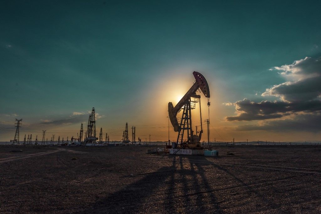 Oil workers are drilling a well in the Gobi in Karamay, Xinjiang province, China, on August 6, 2024. (Photo by Costfoto/NurPhoto) (Photo by CFOTO / NurPhoto / NurPhoto via AFP)