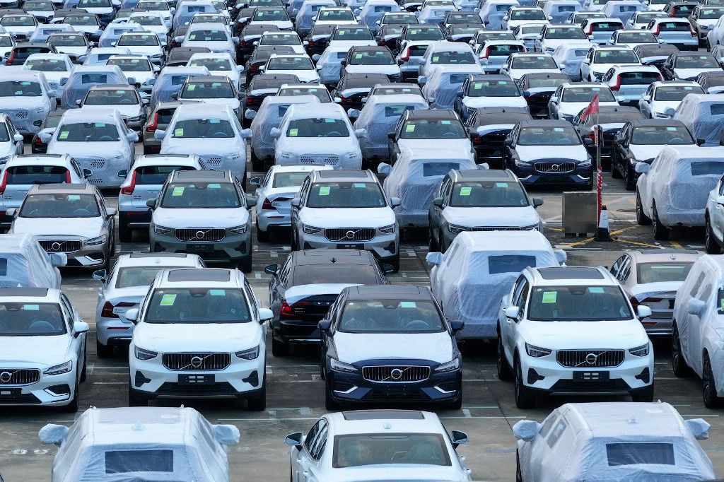 Volvo cars are lining up for export at the Port of Nanjing in Nanjing, China, on August 6, 2024. According to the China Association of Automobile Manufacturers, data collated by the General Administration of Customs show that in the first half of this year, China's auto exports are reaching 2.932 million units, an increase of 25.3%; exports are amounting to 55.16 billion US dollars, up 18.8% year on year. (Photo by Costfoto/NurPhoto) (Photo by CFOTO / NurPhoto / NurPhoto via AFP)