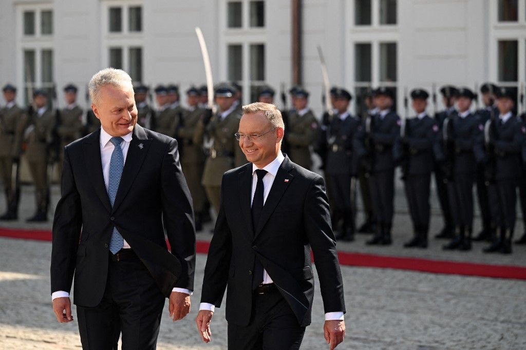 Poland's President Andrzej Duda greets Lithuania's President Gitanas Nauseda during a welcoming ceremony at the Presidential Palace in Warsaw, Poland on September 4, 2024. (Photo by Sergei GAPON / AFP)