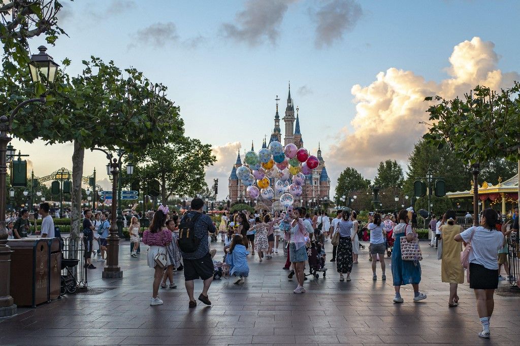 Tourists play at Shanghai Disneyland during Mid-Autumn Festival holiday, Disney