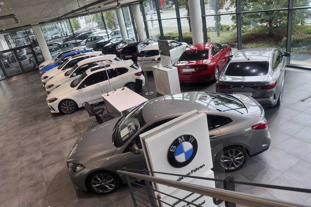 BMW 
Used cars in a BMW dealership.