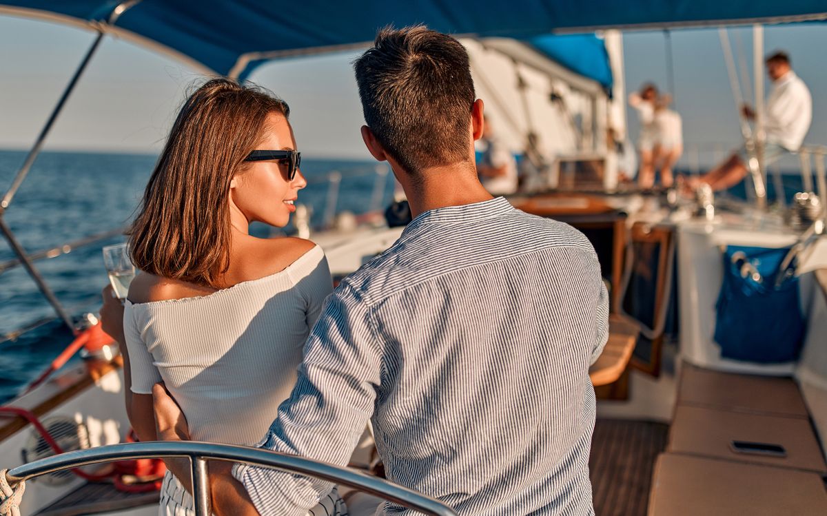 Group,Of,Friends,Relaxing,On,Luxury,Yacht.,Having,Fun,Together