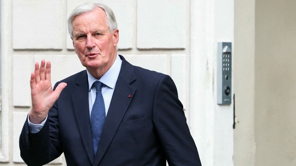 Newly appointed Prime minister Michel Barnier gestures before the handover ceremony at the Hotel Matignon in Paris, on September 5, 2024. France's President Emmanuel Macron appointed former right-wing minister and European Commissioner Michel Barnier as Prime Minister on September 5, 60 days after the second round of legislative elections that resulted in a National Assembly without a majority. (Photo by Thomas SAMSON / AFP)