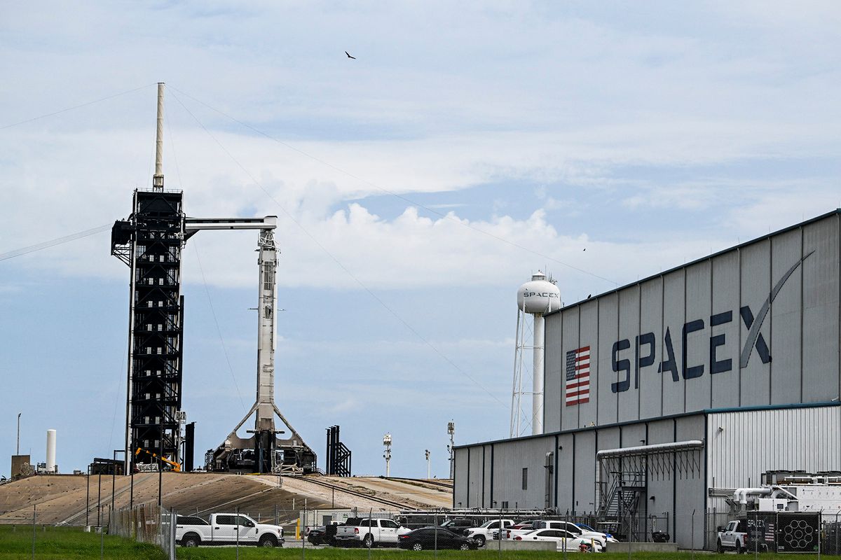 elun musk vietnám A SpaceX Falcon 9 rocket with the Crew Dragon Resilience capsule sits on Launch Complex 39A at Kennedy Space Center ahead of the Polaris Dawn Mission in Cape Canaveral, Florida, on September 9, 2024. The launch window will open early on Tuesday morning, September 10, 2024. (Photo by CHANDAN KHANNA / AFP)