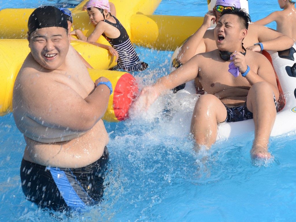 Summer camps held across China to help obese children lose weight