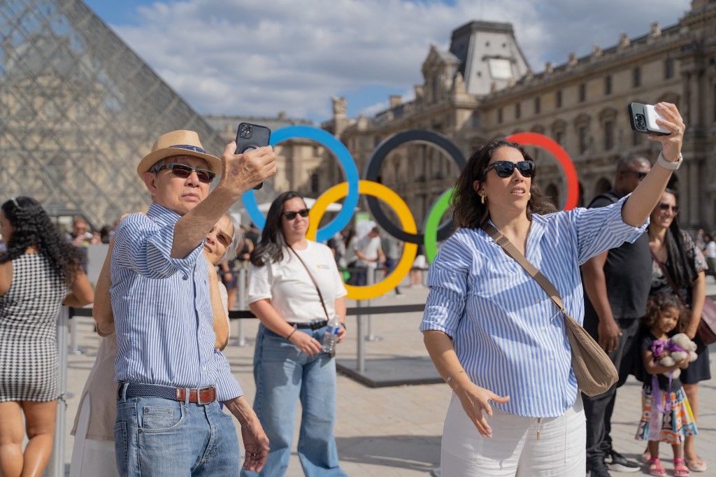 FRANCE - OLYMPIC RINGS AT THE LOUVRE