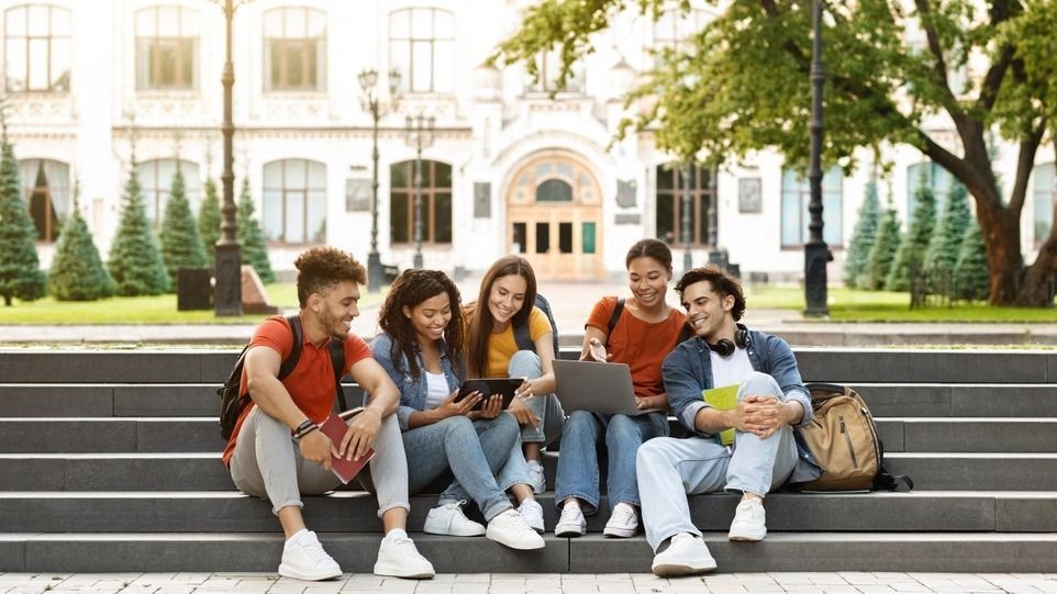 Group,Of,Students,With,Digital,Tablet,And,Laptop,Study,Together