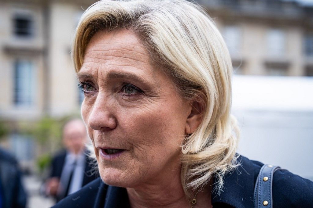 Marine Le Pen, president of the Rassemblement National, RN, ex-front national, extreme right-wing party, makes a statement to the press in the main courtyard of the Assemblee Nationale after a meeting of the group, during a welcome day for deputies elected in the second round of the 2024 legislative elections at the Palais Bourbon of the French National Assembly, Paris, FRANCE, on 10 July 2024.
Marine Le Pen, presidente du groupe Rassemblement National, RN, ex front national, parti d extreme droite, fait une declaration a la presse dans la cour d honneur de l Assemblee Nationale a la sortie d un reunion du groupe, lors d une journee d accueil des deputes elus au second tour des elections legislatives 2024 au Palais Bourbon de l Assemblee Nationale francaise, Paris, FRANCE, le 10 juillet 2024. (Photo by Xose Bouzas / Hans Lucas / Hans Lucas via AFP)