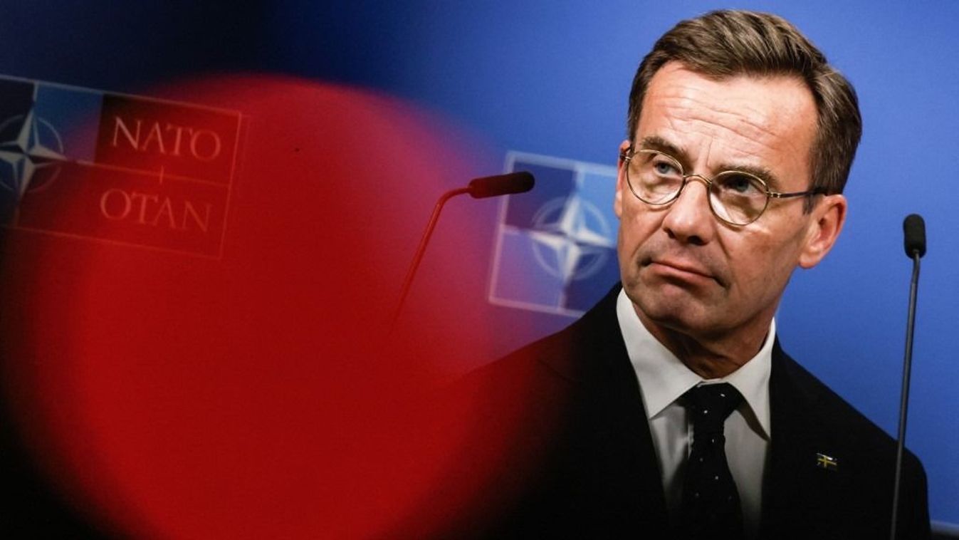 Swedish Prime Minister Ulf Kristersson gives a press conference with NATO Secretary General Mark Rutte (unseen) at the NATO headquarters in Brussels, on October 16, 2024. (Photo by Simon Wohlfahrt / AFP)