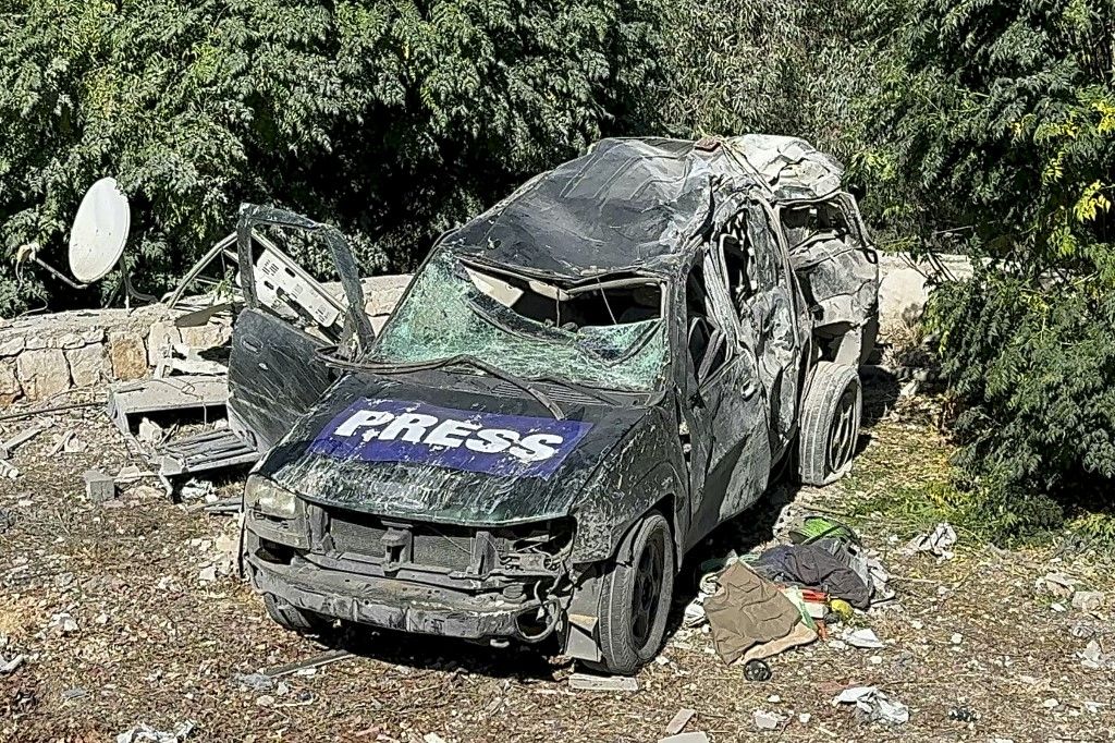 This picture shows a car marked "Press" at the site of an Israeli airstrike that targeted an area where a number of journalists were located in the southern Lebanese village of Hasbaya on October 25, 2024. Lebanon's Information Minister Ziad Makary accused Israel on October 25 of intentionally targeting journalists in a strike on the country's south that killed three journalists, which he described as a "war crime". (Photo by Ali Hankir / AFP)