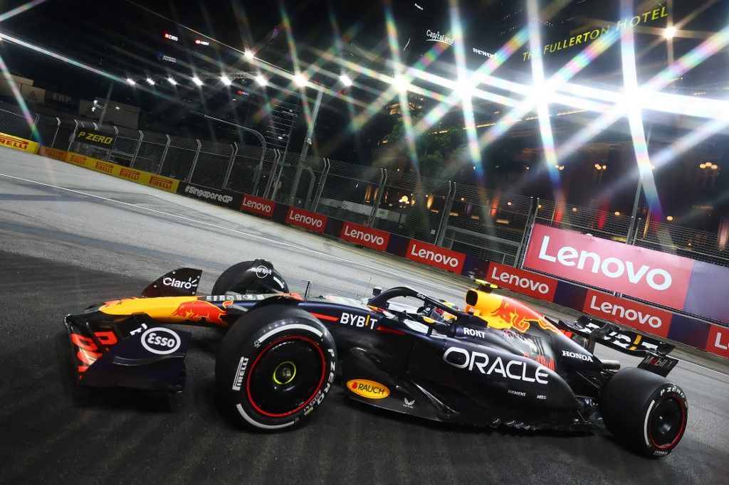 F1 Grand Prix Of Singapore - Practice
Sergio Perez of Mexico drives the Red Bull Racing-Honda RBPT RB20 during practice ahead of the F1 Grand Prix of Singapore at Marina Bay Street Circuit in Singapore, Singapore, on September 20, 2024. (Photo by Morgan Hancock/NurPhoto) (Photo by Morgan Hancock / NurPhoto / NurPhoto via AFP)