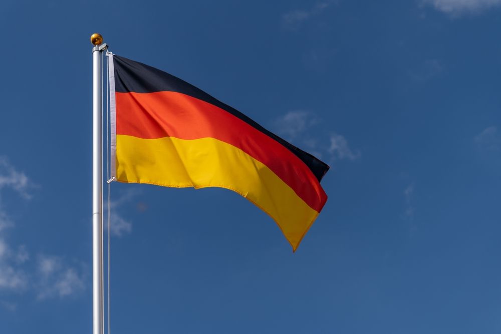 Germany,Flag,Flying,On,A,Flagpole,,Light,Wind,,Illuminated,By