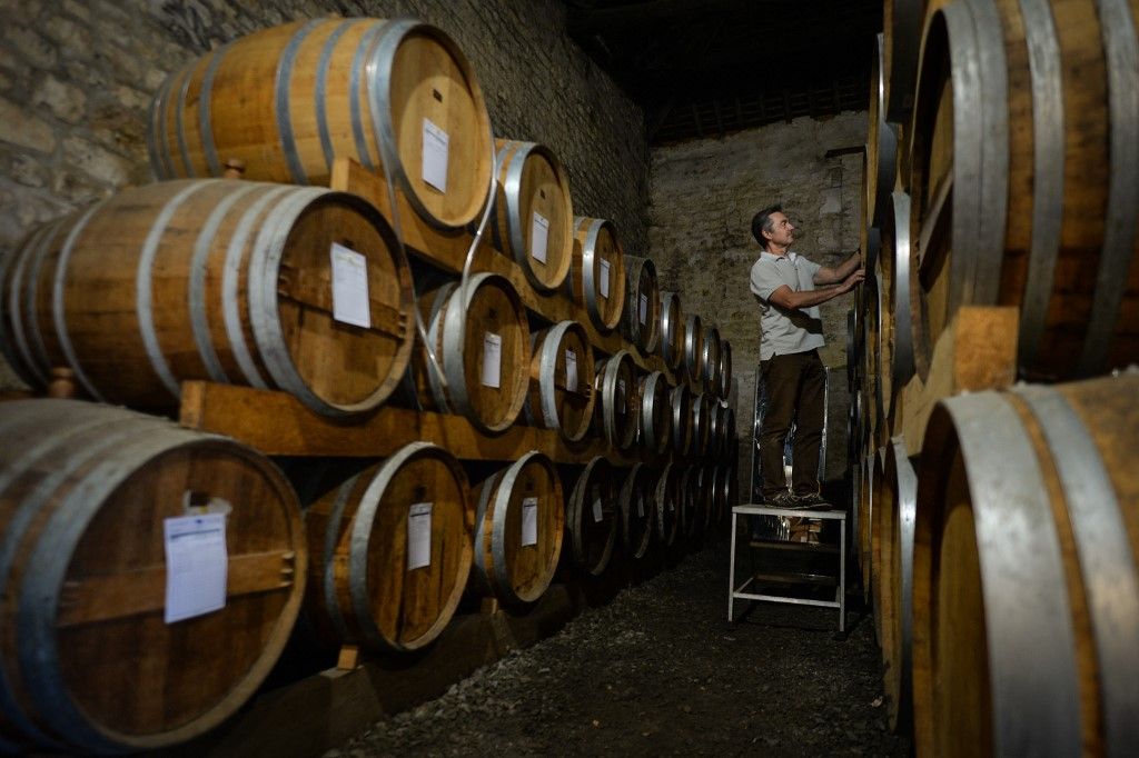 Daily Life In Normandy
Jean-Olivier Petrich, co-owner of The Domaine de La Flaguerie / Les Vergers de Ducy, checks the old oak barrels used to age Calvados (apple brandy).
On Monday, July 19, 2021, in Ducy-Sainte-Marguerite, Calvados, Normandy, France. (Photo by Artur Widak/NurPhoto) (Photo by Artur Widak / NurPhoto / NurPhoto via AFP)