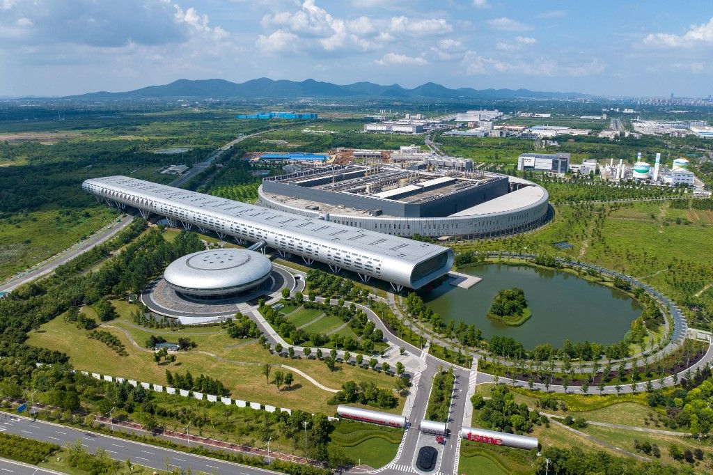 TSMC Factory in Nanjing
An aerial photo is showing the factory of Taiwan Semiconductor Manufacturing Company (TSMC) in Nanjing, Jiangsu province, China, on August 1, 2023. TSMC announced on March 8, 2024, that its consolidated revenue for February 2024 was about NT $181.65 billion, which represents a 15.8% decrease from the previous month, yet an 11.3% increase year-on-year. The cumulative revenue for January to February 2024 was approximately NT $397.43 billion, marking a 9.4% increase over the same period the previous year. (Photo by Costfoto/NurPhoto) (Photo by CFOTO / NurPhoto / NurPhoto via AFP)