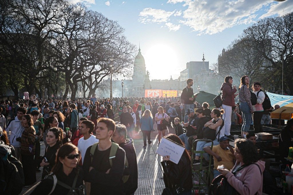 Protest against President Milei's education cuts in Buenos Aires
BUENOS AIRES, ARGENTINA - OCTOBER 02: Thousands of demonstrators, holding banner and flags, gather outside the National Congress to protest against President Javier Milei’s potential veto of the University Funding Law in Buenos Aires, Argentina on October 02, 2024. The protesters made their presence felt in response to what they view as an imminent threat to public education, filling urban spaces with banners and chants demanding the protection of the university system’s future. Luciano Adan Gonzalez Torres / Anadolu (Photo by Luciano Adan Gonzalez Torres / ANADOLU / Anadolu via AFP)