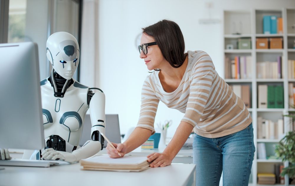 Woman,And,Ai,Robot,Working,Together,In,The,Office,,Automation