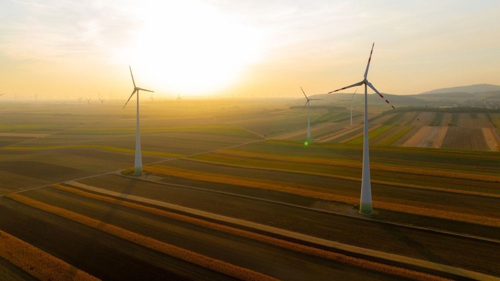 szélerőmű, Alteo, megújuló energia, Wind,Turbines,Harnessing,Wind,Power,During,Sunrise,,Set,In,An