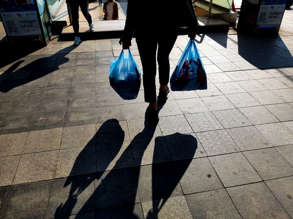 Bucharest,,Romania,-,October,20,,2021:,People,With,Shopping,Bags